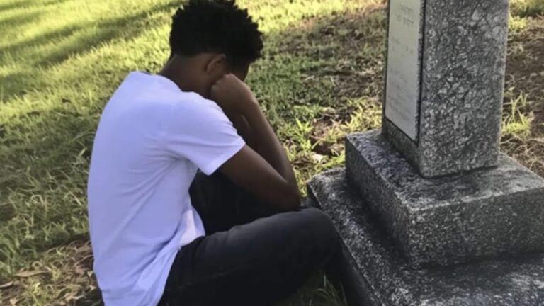 At His Adoptive Mother’s Grave, a Boy Discovers an Envelope with His Name