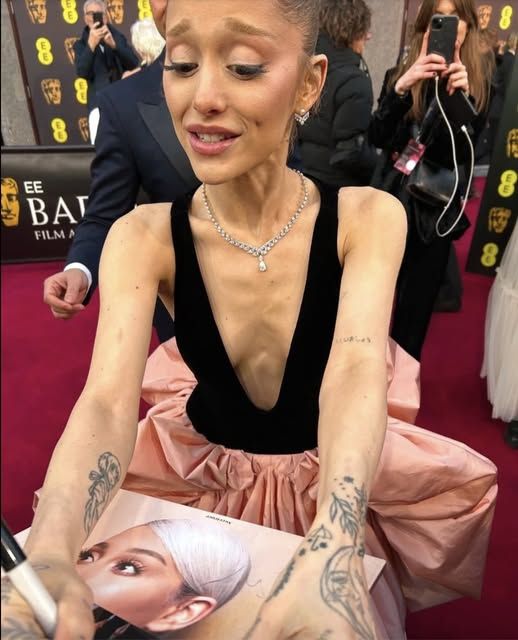 “Sweet Moment Turns Bittersweet: Ariana Grande Signs Fan Photos at the BAFTAs — But One Heartbreaking Detail Has Everyone Talking”