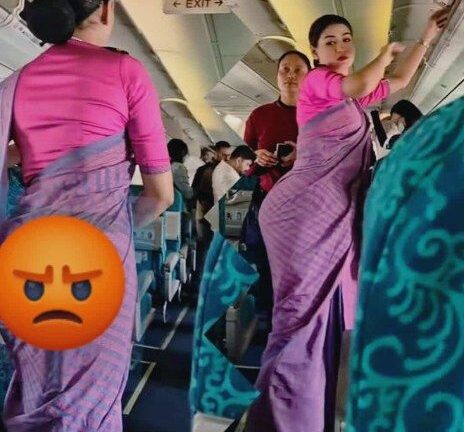 Viral Flight Attendant Video Sparks Online Buzz Over Unconventional Uniform…